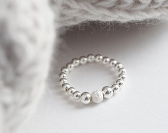Sterling Silver stretch ring with Stardust bead