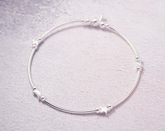 Sterling Silver stretch noodle bracelet with Star and Moon beads