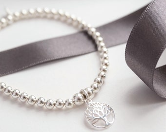 Sterling Silver stretch bracelet with Circle Tree of Life charm