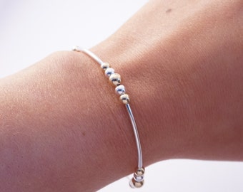 Sterling Silver and Gold stretch noodle bracelet