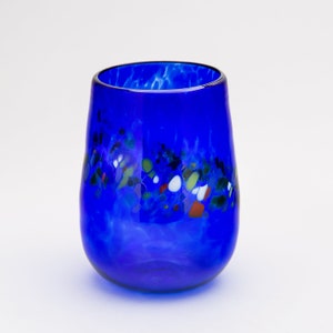 Handblown Cobalt Blue Stemless Wine Glass with a Spotted Rainbow Band