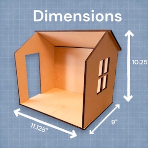 May include: A cardboard model house with a brown roof, a window with two panes, and a doorway. The house is 11.125 inches wide, 9 inches deep, and 10.25 inches tall.
