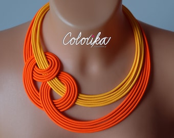 Neon oranje ketting, ketting met knoop, oranje ketting, knoop ketting, geknoopte ketting, kleurrijke ketting, heldere ketting, gewaagde ketting