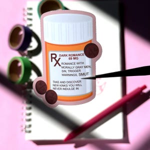 The image shows a sticker shaped like an orange and white medical pill bottle. The bottle is for the dark romance genre in books, movies, television, and other forms of media. The design is accented with dark red and pills with hearts on it. The text on the bottle reads - Dark Romance 69mg, romance with morally gray men, sin, trigger warnings, smut.Take and discover new kinks you will never indulge in.