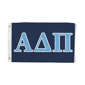 May include: A navy blue flag with white lettering that reads "ΑΔΠ" in light blue.