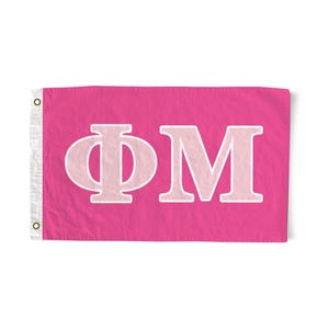May include: A pink flag with the letters "ΦΜ" in white outlined in pink.