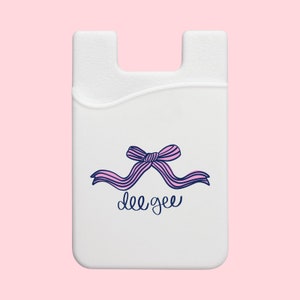 Cartera para teléfono con lazo coqueto de la hermandad Delta Gamma