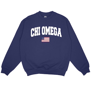 May include: Navy blue sweatshirt with white text that reads "CHI OMEGA" and a small American flag graphic.