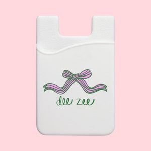 Cartera para teléfono con lazo coqueto de la hermandad Delta Zeta
