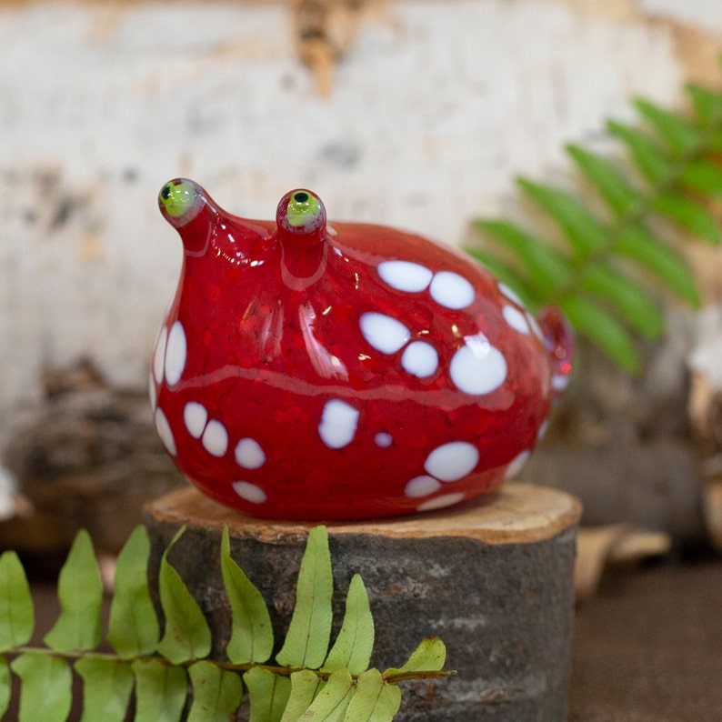 Red glass slug figurine