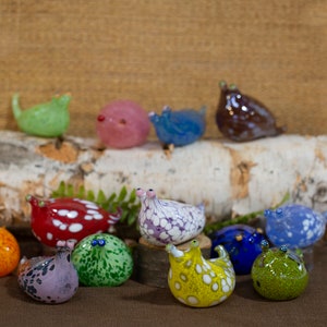 Assorted colors glass slug figurine