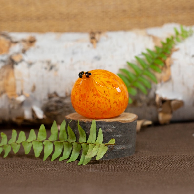 Adorable orange slug figurine