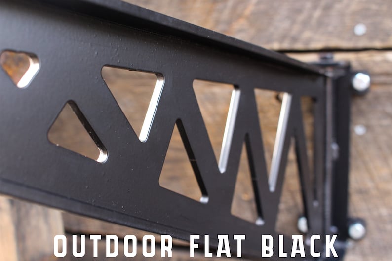 May include: Black metal shelf bracket with a triangular cut-out design. The bracket is labelled "OUTDOOR FLAT BLACK".