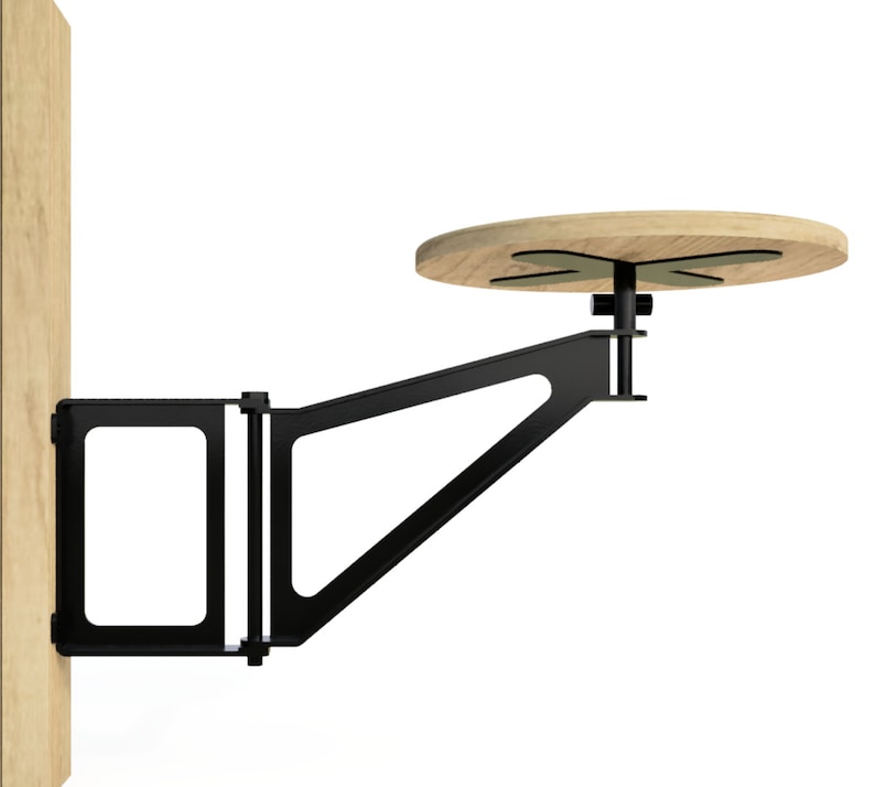 May include: A black metal wall-mounted table with a round wooden top. The table is attached to the wall with a bracket and has a swiveling arm.