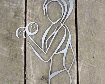 May include: A metal silhouette of a person lifting a dumbbell. The silhouette is cut out of metal and has a silver finish.