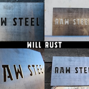 May include: Four metal signs with the words "RAW STEEL WILL RUST" on them. The signs are different shades of grey and have a rustic look.