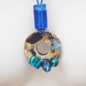 Dainty jewelry with a ceramic pendant