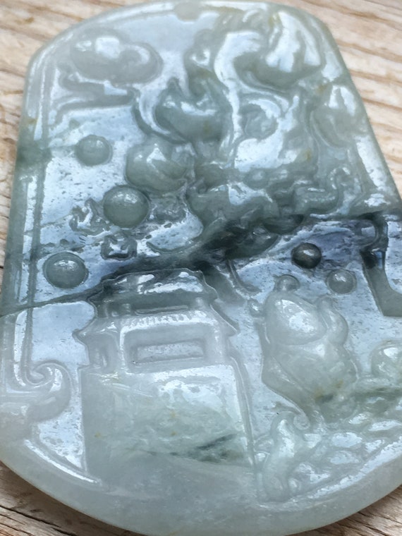 Grade A Icy Light Green with Moss Jadeite Landscap