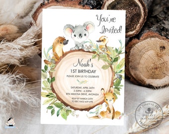 May include: A printable invitation for a 1st birthday party with a woodland theme. The invitation features a koala, a platypus, a kookaburra, and a kangaroo on a tree stump with green leaves. The text on the invitation reads "You're Invited! Noah's 1st Birthday. Please join us to celebrate. Saturday, April 26th, 3:30pm - 6:30pm, 896 Mimosa Drive, Avonlea. RSVP by March 25th to BEC 0432 659 698."