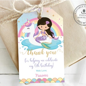 May include: A thank you tag with a mermaid riding a unicorn. The tag is decorated with a rainbow, stars, and seashells. The text on the tag reads "Thank you for helping me celebrate my 6th birthday! With Love, Naomi."