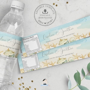 May include: Water bottle label with a blue and white watercolor background featuring seashells and starfish. The text reads "Caroline & Jonathan Thank you for sharing our special day!"