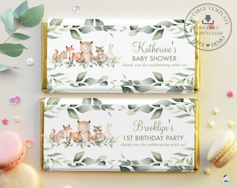 May include: Two printable chocolate bar wrappers with a woodland theme. The top wrapper says "Katherine's Baby Shower" and the bottom wrapper says "Brooklyn's 1st Birthday Party". Both wrappers feature a watercolor illustration of a bear, fox, squirrel, raccoon, and rabbit.