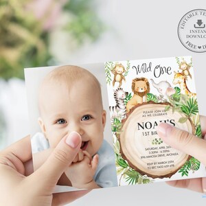 May include: A printable invitation for a first birthday party with a jungle theme. The invitation features a watercolour illustration of a lion, zebra, giraffe, and monkey. The text on the invitation reads "Wild One" and includes the child's name, date, time, and location of the party.