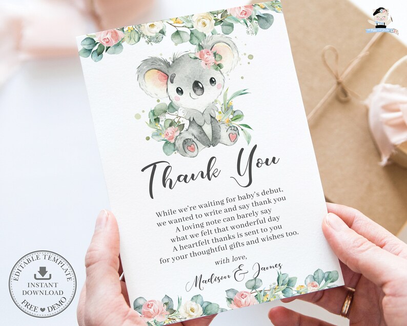 May include: A baby shower thank you card featuring a watercolor illustration of a gray koala bear surrounded by flowers and greenery. The card includes the text "Thank You" and a personalized message.