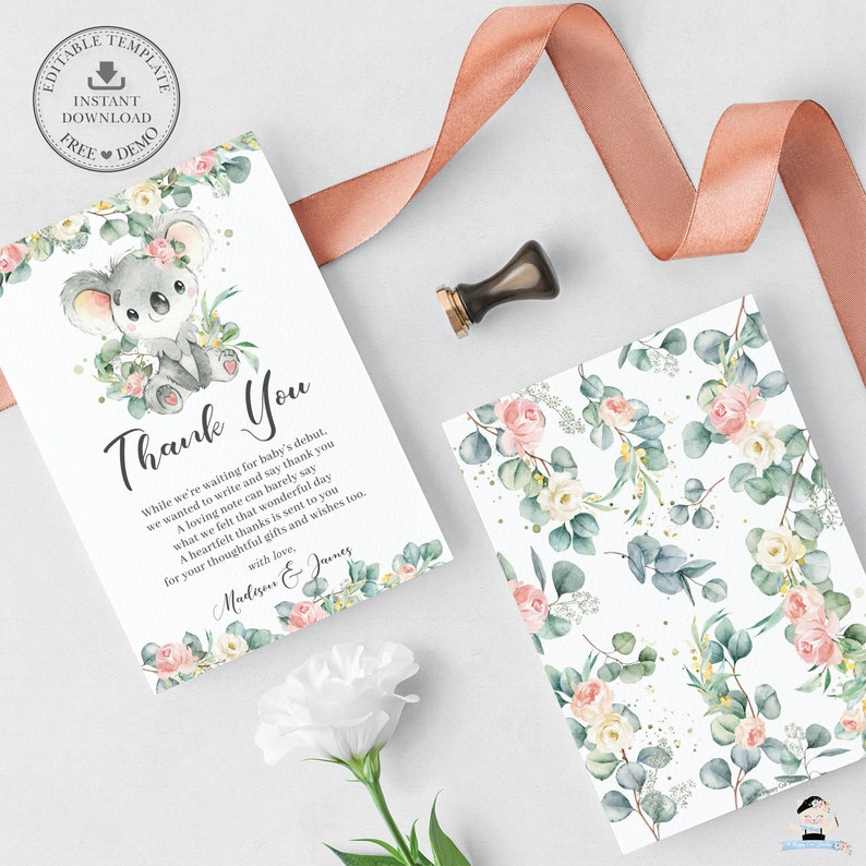 May include: Baby shower thank you cards with a koala bear illustration and floral accents. The cards feature the text "Thank You" and a message. A white flower, a ribbon, and a wax seal are also present.