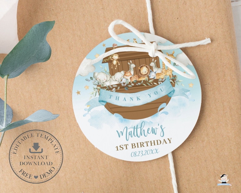 May include: Round blue and brown thank you tag with a watercolor illustration of Noah's Ark with animals. The tag says "Thank You" and "Matthew's 1st Birthday 08.23.20XX".