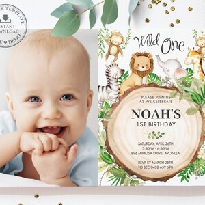 May include: A printable invitation for a first birthday party with a jungle theme. The invitation features a photo of a baby boy, a wooden circle with the text "Wild One", and illustrations of jungle animals including a lion, zebra, giraffe, monkey, and elephant. The invitation also includes the text "Noah's 1st Birthday", the date and time of the party, the address, and RSVP information.