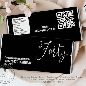 Puede incluir: Dos envoltorios rectangulares negros para barras de chocolate con texto en blanco. Uno presenta una etiqueta de información nutricional, un código QR con el texto Scan to upload your pictures, y el otro muestra la palabra Forty en cursiva.