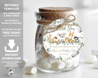 May include: A round, white thank you tag with green foliage and woodland animals. The tag says "Thank You" and "For coming & celebrating with us! Alexa's 1st Birthday Party 08.25.20XX".