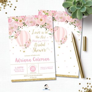 May include: Pink and gold bridal shower invitation with a hot air balloon and floral design. The text reads "Love is in the Air! Please join us for a Bridal Shower in honor of bride-to-be Adriana Coleman. Saturday, June 26, 20XX, 1:30 PM, 68 Mimosa Ave, Meadowbank. RSVP to Sarah 633-699-8589 by June 6th. Adriana is registered at Target & Walmart."