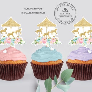 May include: Three cupcake toppers featuring a gold glitter carousel with pink and blue flowers. The toppers are on top of cupcakes with pink, blue, and purple frosting.  DIY Digital File Instant Download Print Today.