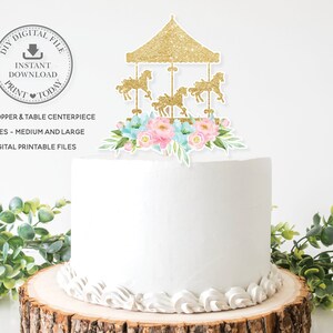 May include: A printable cake topper and table centrepiece featuring a gold glitter carousel with pastel pink and blue flowers. The design comes in two sizes: medium and large.