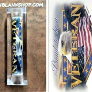 May include: A clear acrylic pen blank with a printed image of an eagle and the word "Veteran" inside. The image also includes a red, white, and blue American flag. The text "Proud to be a Veteran" is printed on the background.