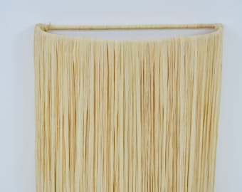 Large raffia wall light