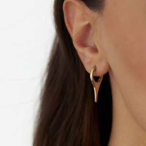 Gold needle and thread earrings top