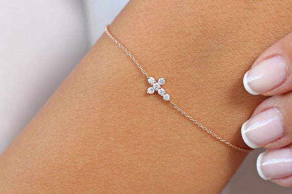 Gold diamond cross bracelet best sale
