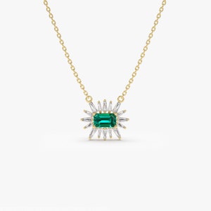 14k Tapered Baguette Diamond necklace with an Emerald