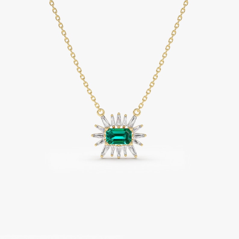 14k Tapered Baguette Diamond necklace with an Emerald