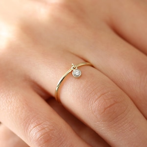 14k Gold Thin Ring with a 0.05ctw Round White Diamond Dangling Charm Ring - Round Cut Diamond Dangle Ring / Stacking Diamond Ring