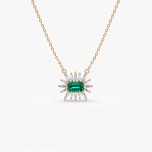 14k Rose Gold Tapered Baguette Diamond necklace with an Emerald