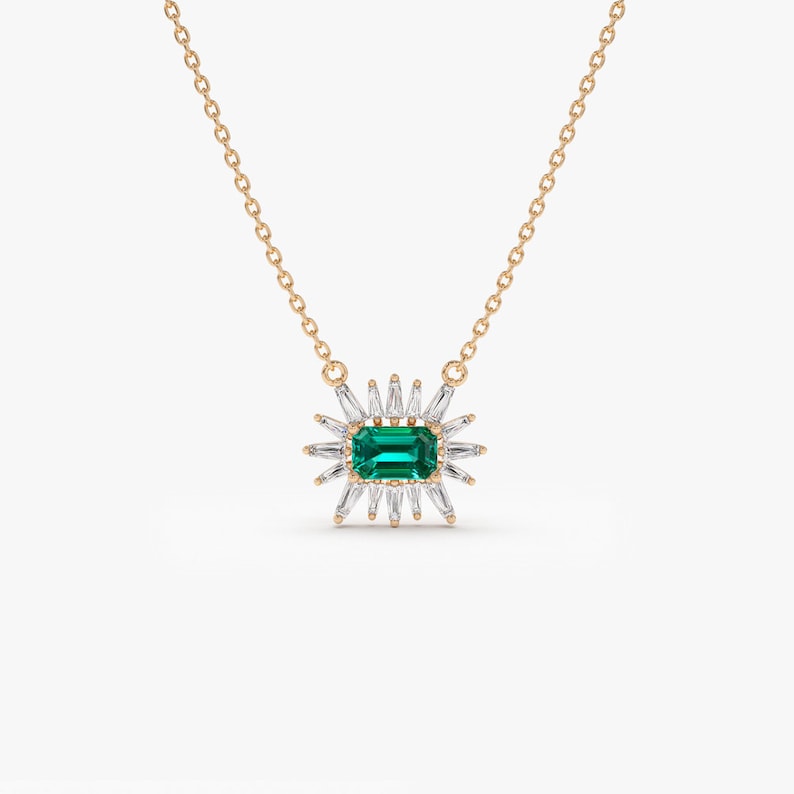 14k Rose Gold Tapered Baguette Diamond necklace with an Emerald