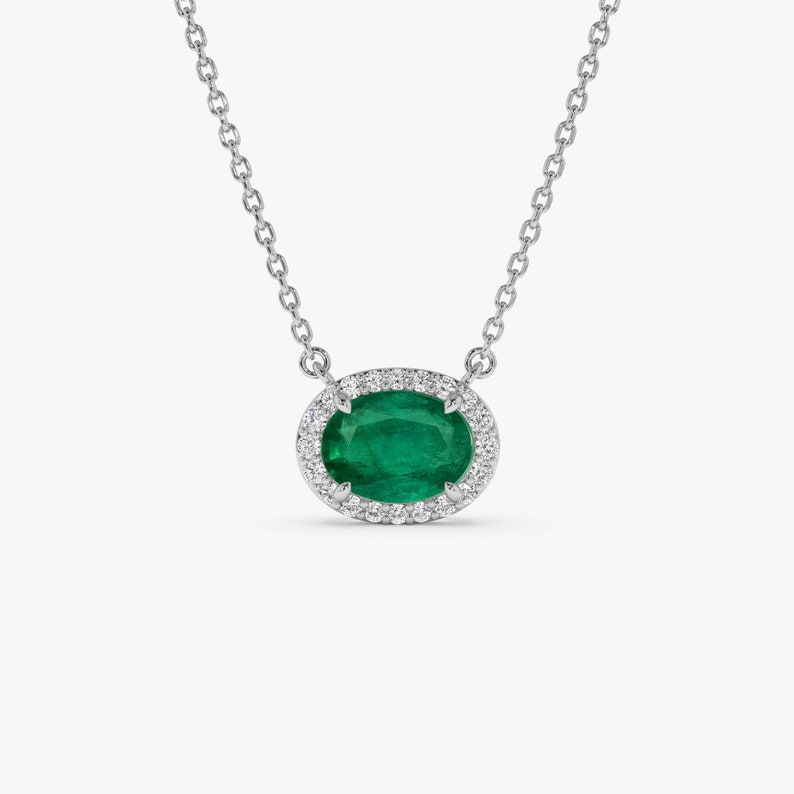 14k White Gold Oval Shape Emerald in Diamond Halo Setting