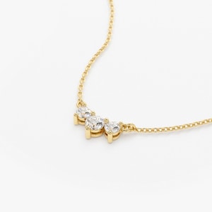 14k Gold Three stone diamond necklace Side Angle
