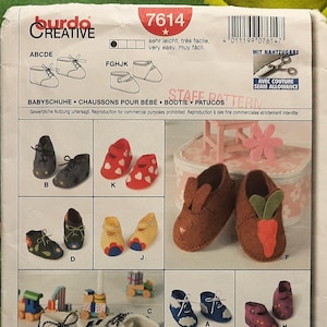 May include: A sewing pattern for baby shoes, featuring various shoe designs in different colors and styles. The pattern includes illustrations of booties, sneakers, and other footwear, with the Burda Creative logo at the top.