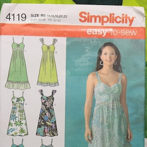 May include: A sewing pattern for a dress with five different variations. The pattern is for sizes 14-22 and includes instructions for making a dress with a fitted bodice and a flowing skirt. The pattern is from Simplicity and is easy to sew.