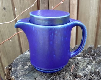 Small blue ceramic teapot